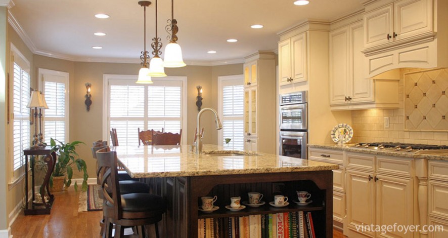 Built in shelves for the center island is a definite perk for this kitchen––it adds the convenience of extra storage space while giving the image of a warm and welcoming home. 