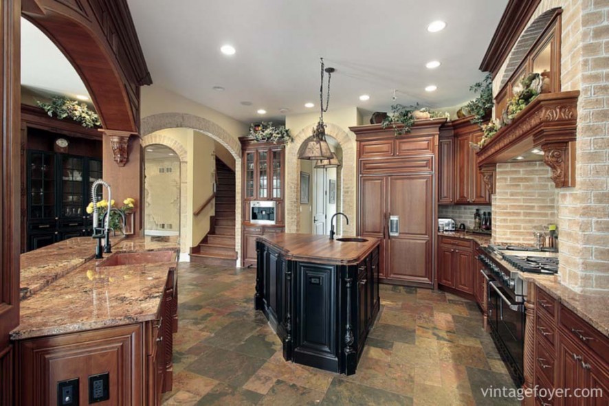 Kitchen in luxury home with cherry wood cabinetry