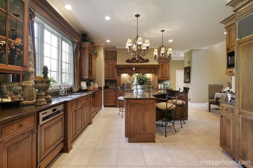 Large kitchen in wood cabinetry with island