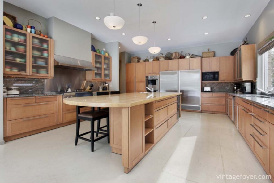 Kitchen in luxury home with wood island